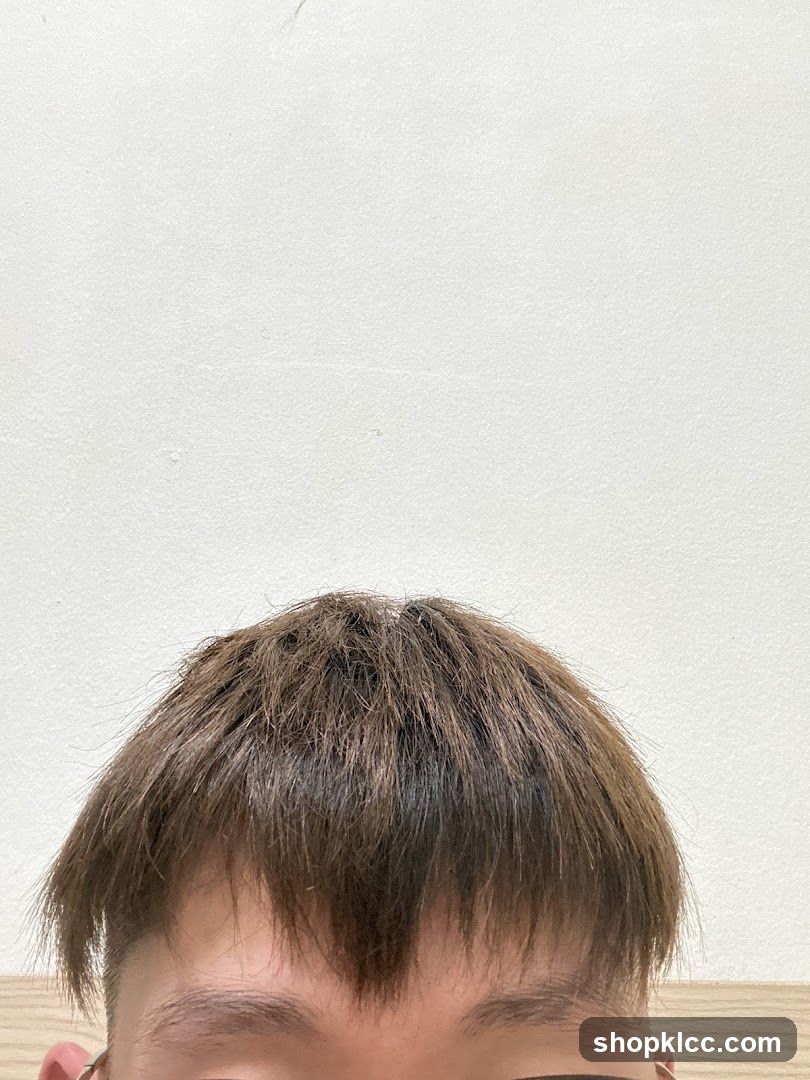 Person's Hair and Forehead