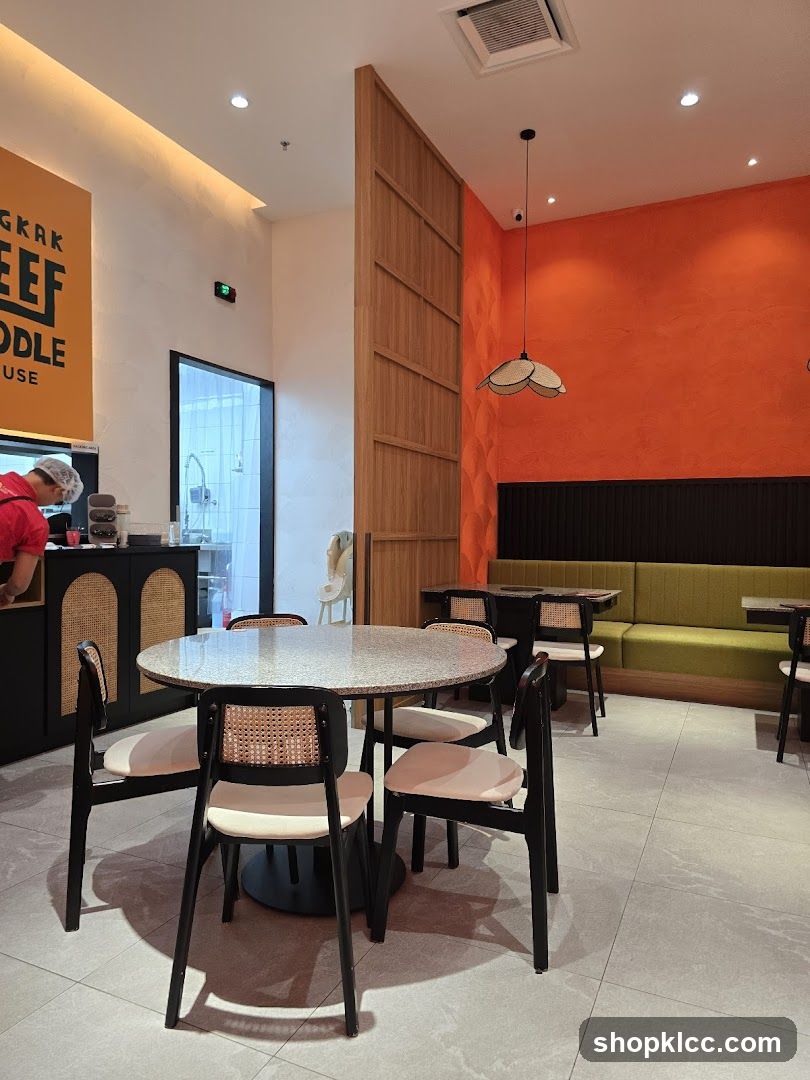 Restaurant Interior with Orange Wall and Modern Seating