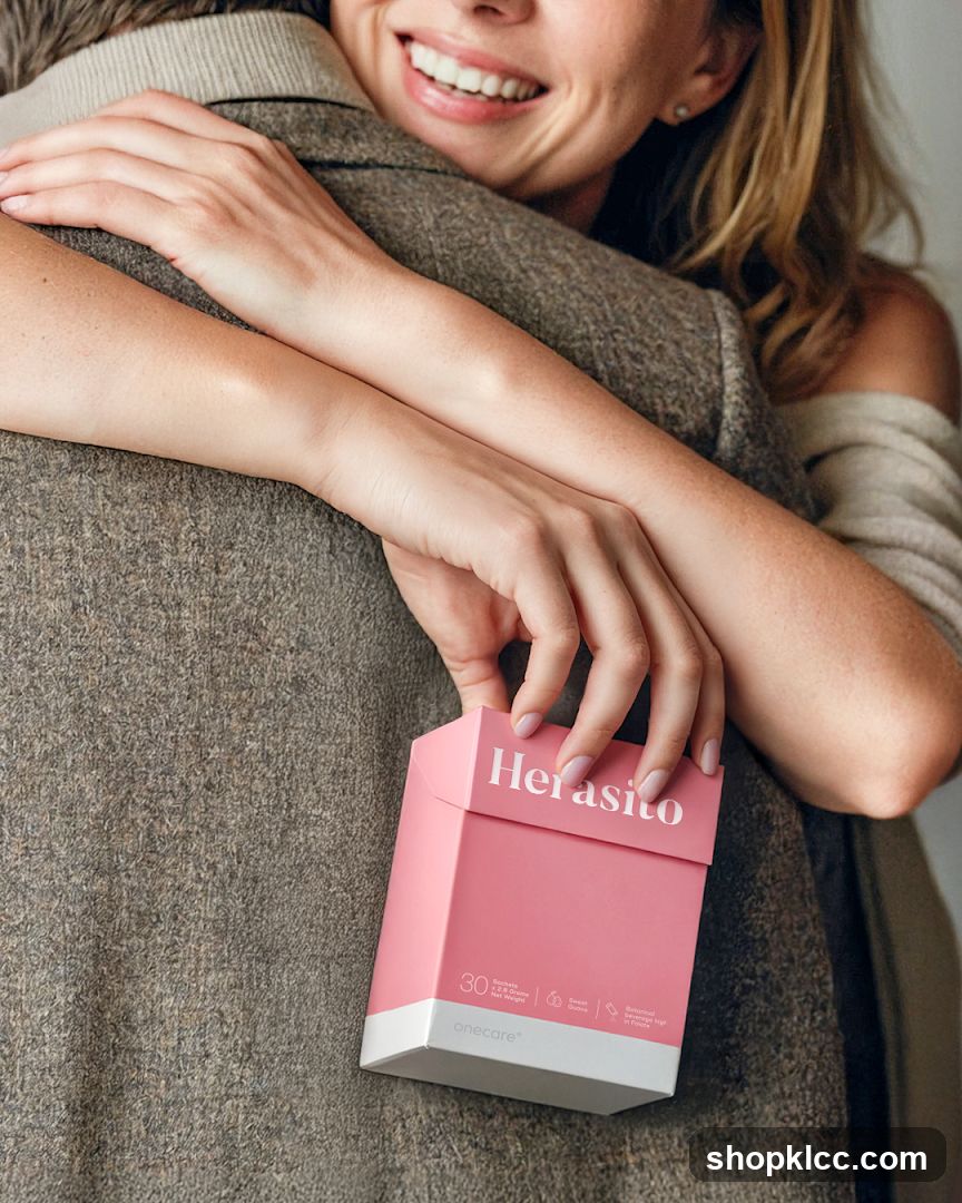 Woman holding a box of Herasito