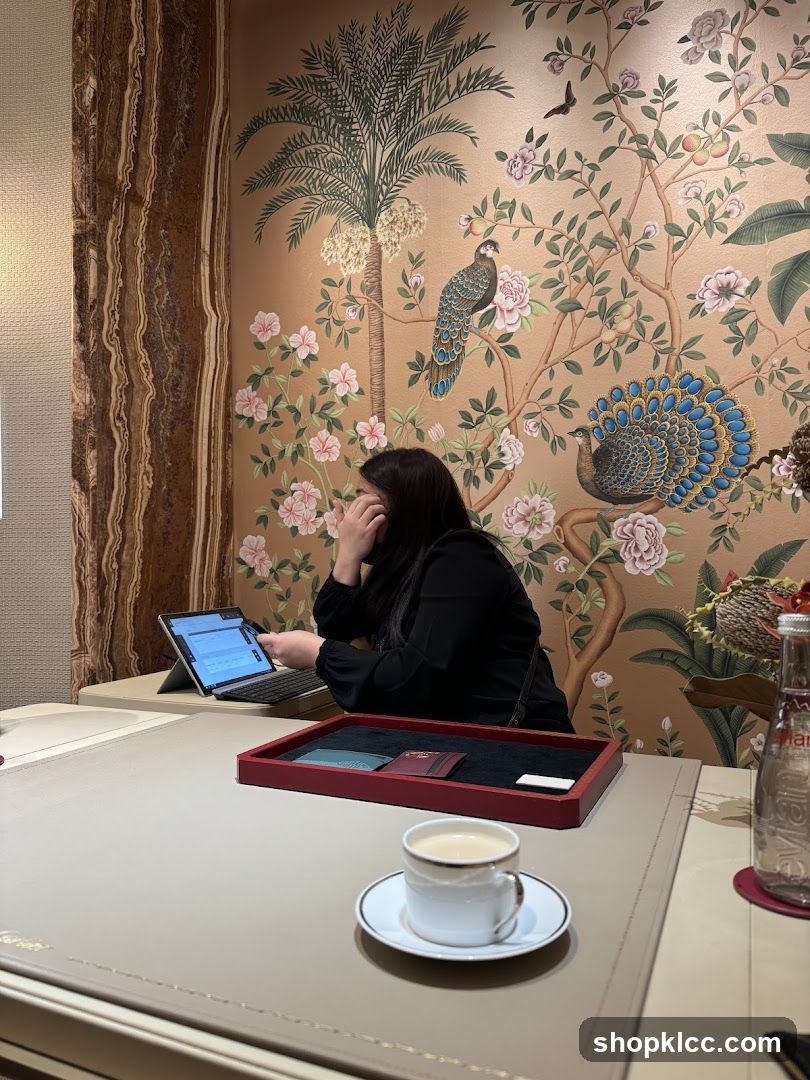 Woman working at a desk with a coffee