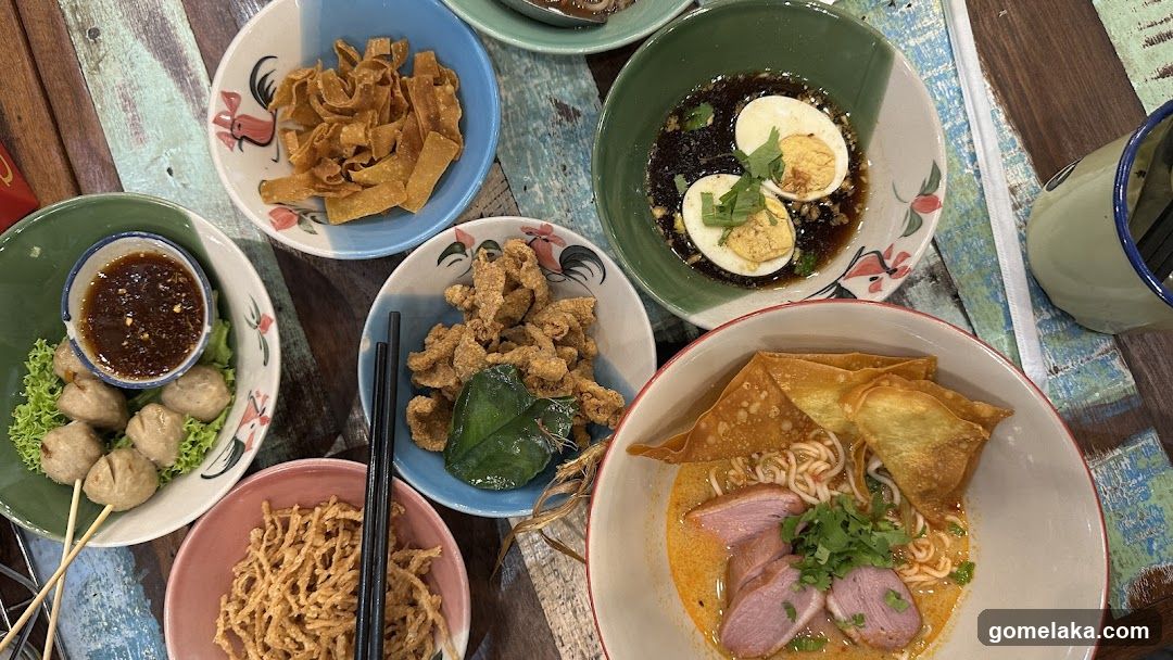Table with Thai dishes