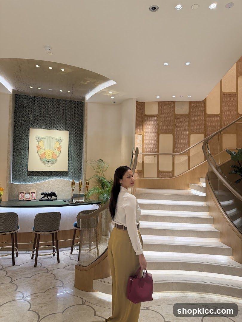 Woman Posing by a Staircase in a Modern Interior