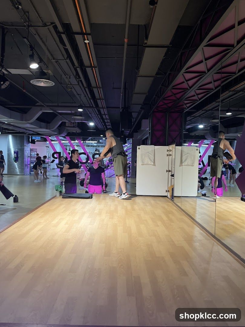Gym interior with people exercising