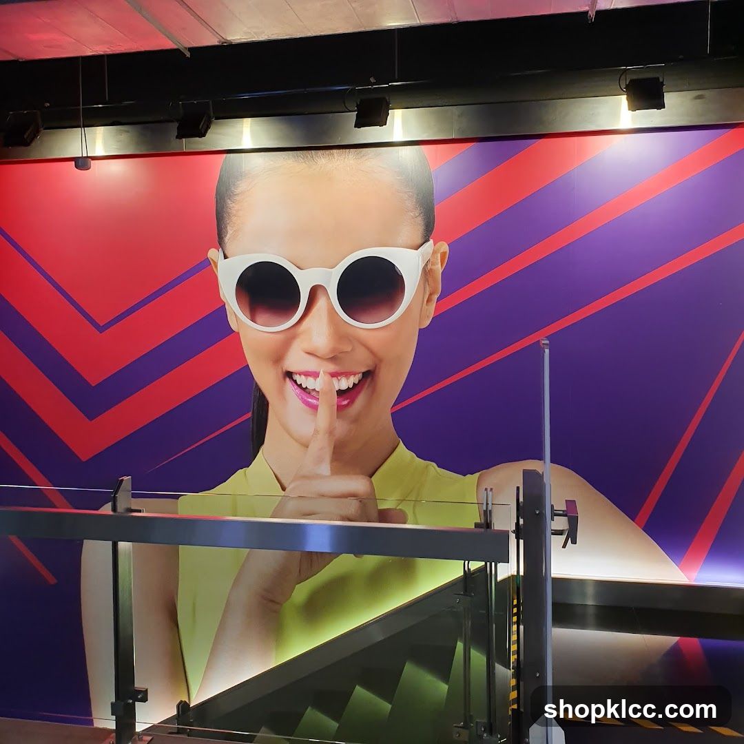 Woman with Sunglasses and Finger to Lips