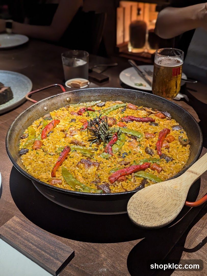 Paella dish with beer and water
