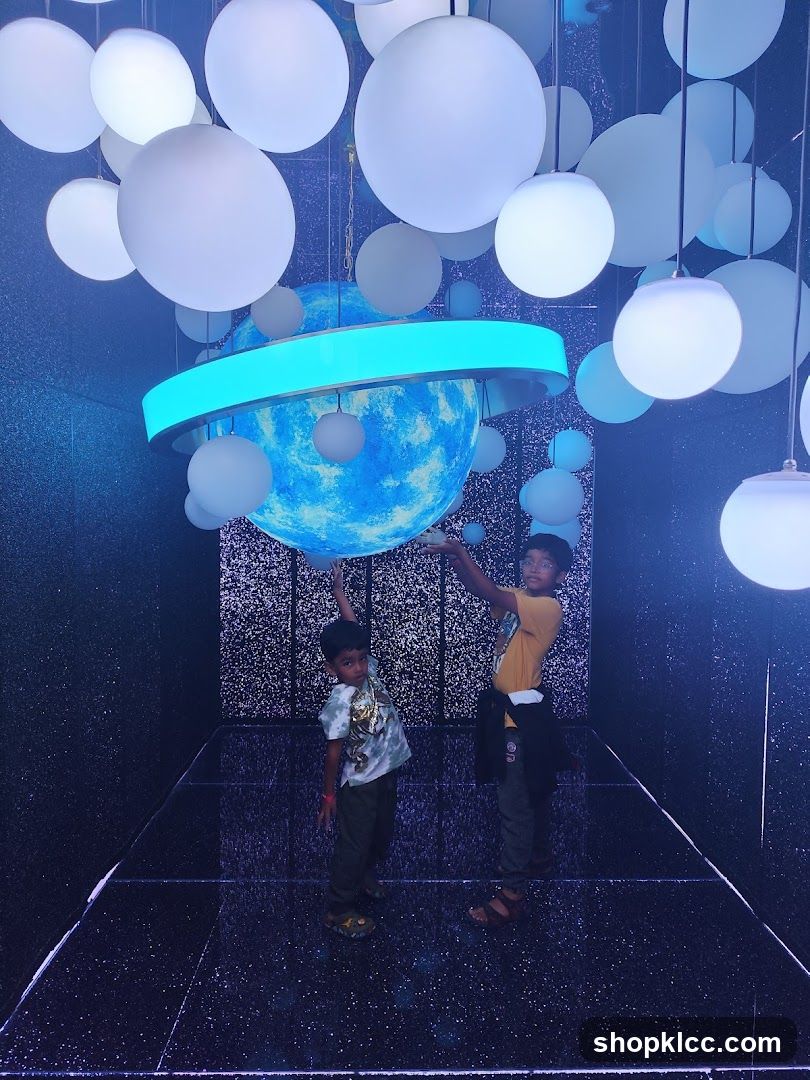Children in a planetarium exhibit