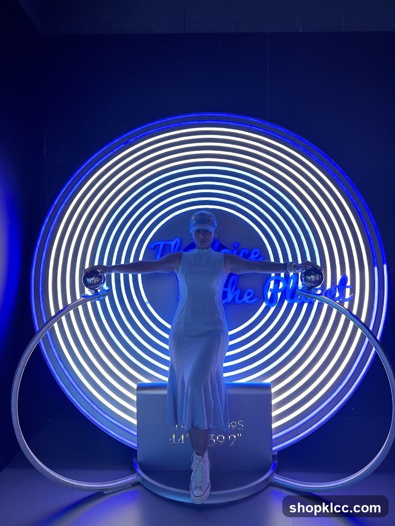 Woman Poses in Front of Neon Circle