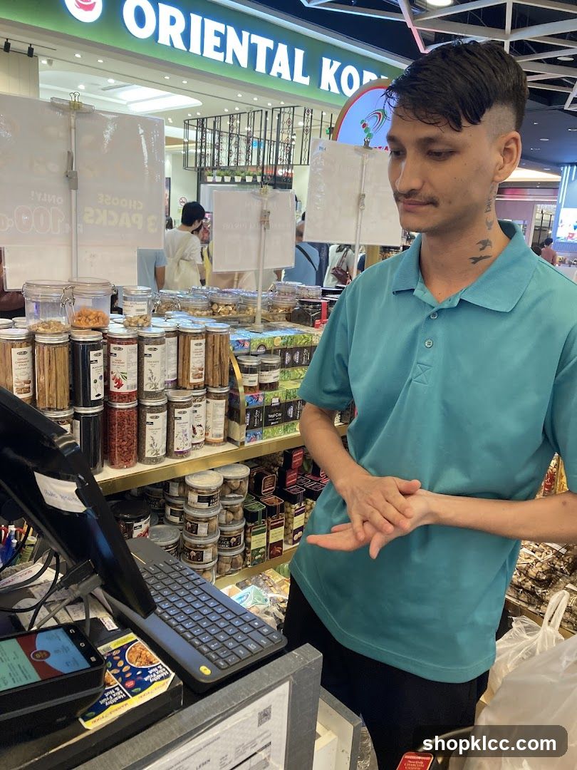 Store Employee at Checkout