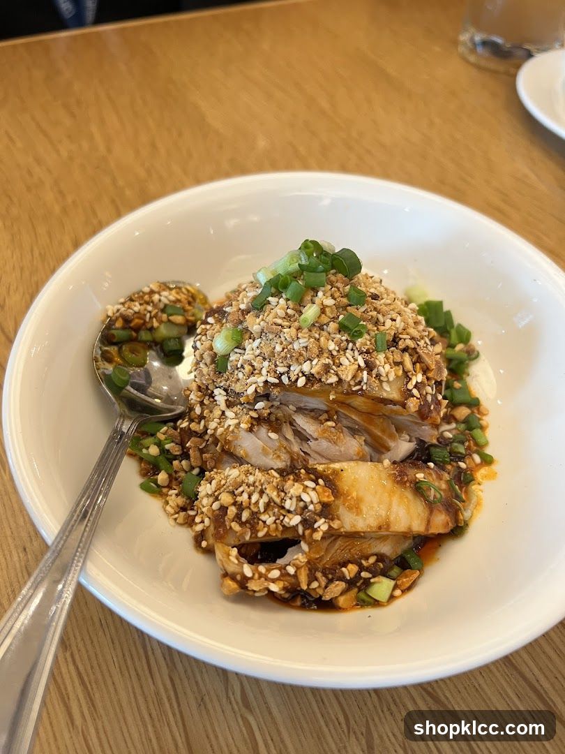 Chicken dish with nuts and scallions
