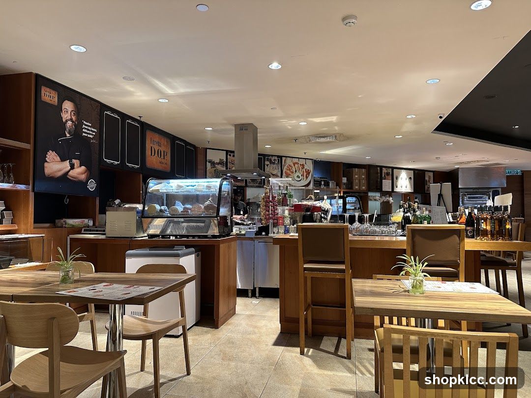 Interior of a cafe with seating and display cases