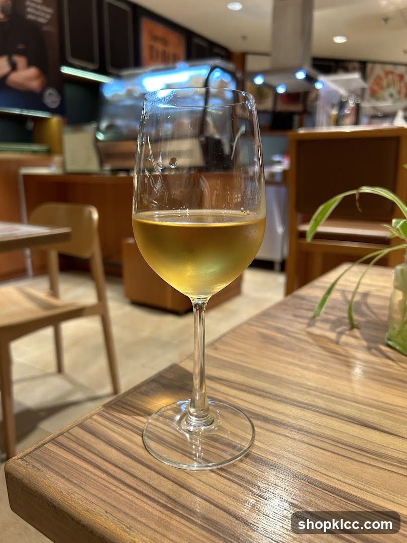 Glass of White Wine on Table