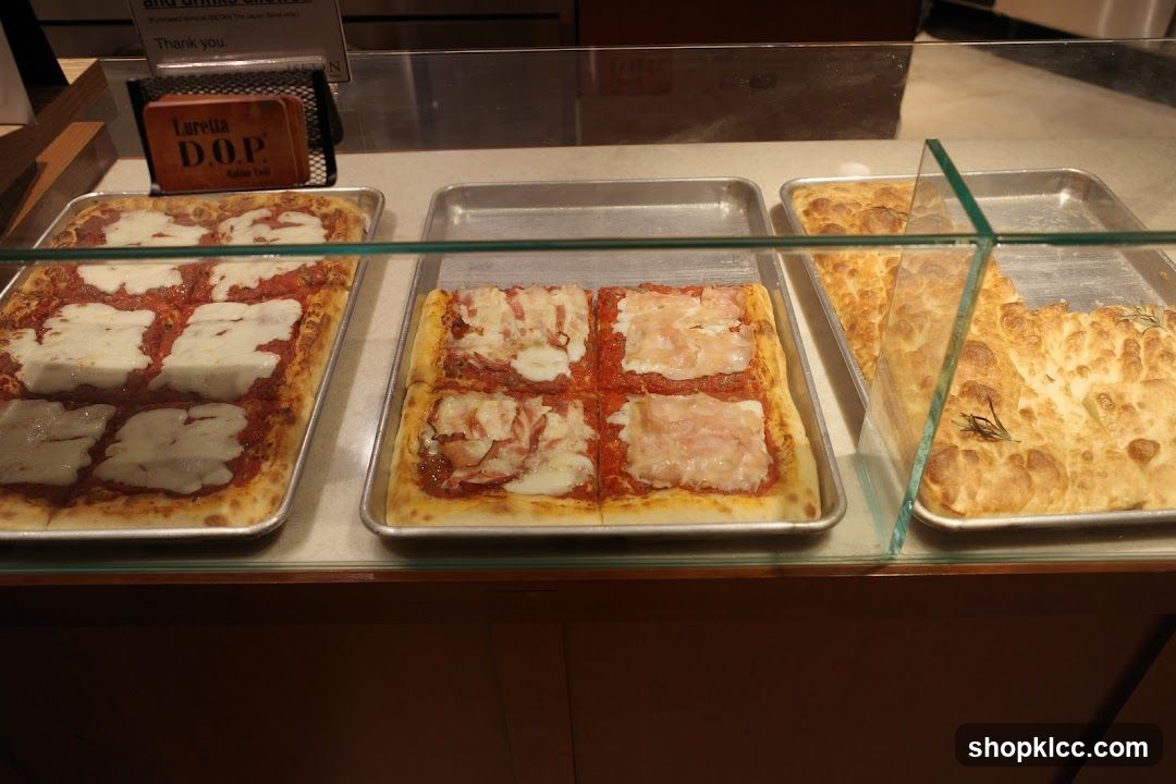 Pizzas and Focaccia in Display Case