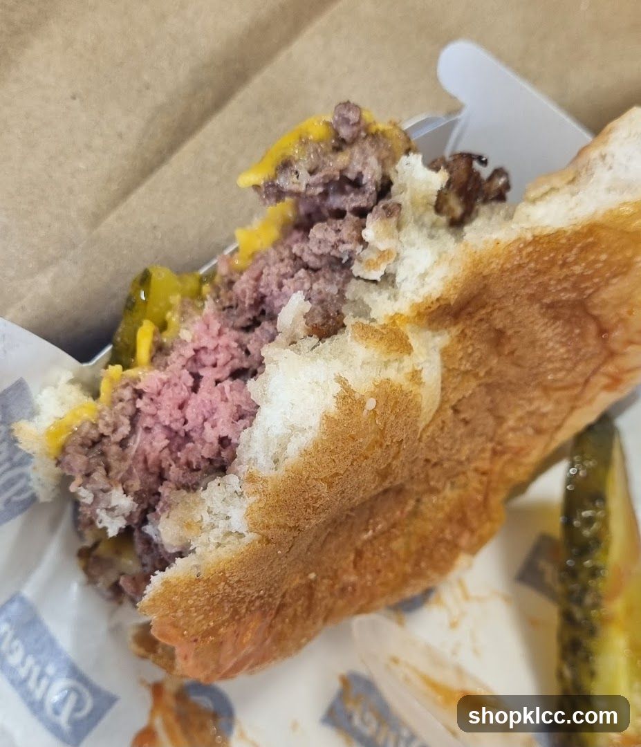 Partially Eaten Cheeseburger