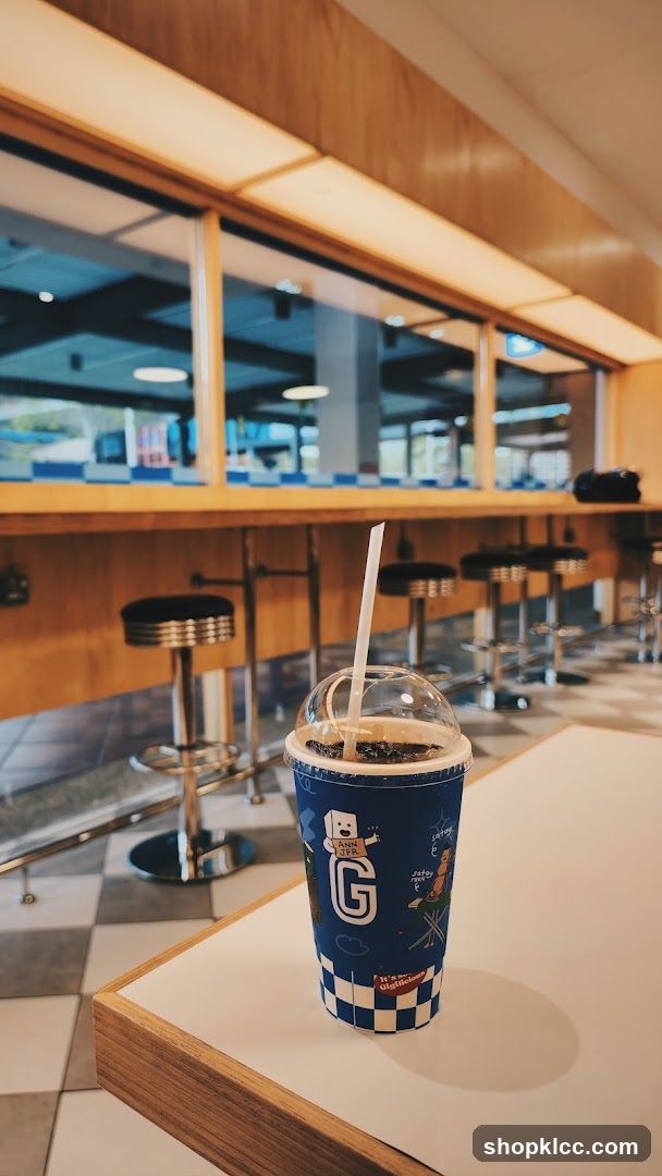 Beverage Cup with Straw on Table