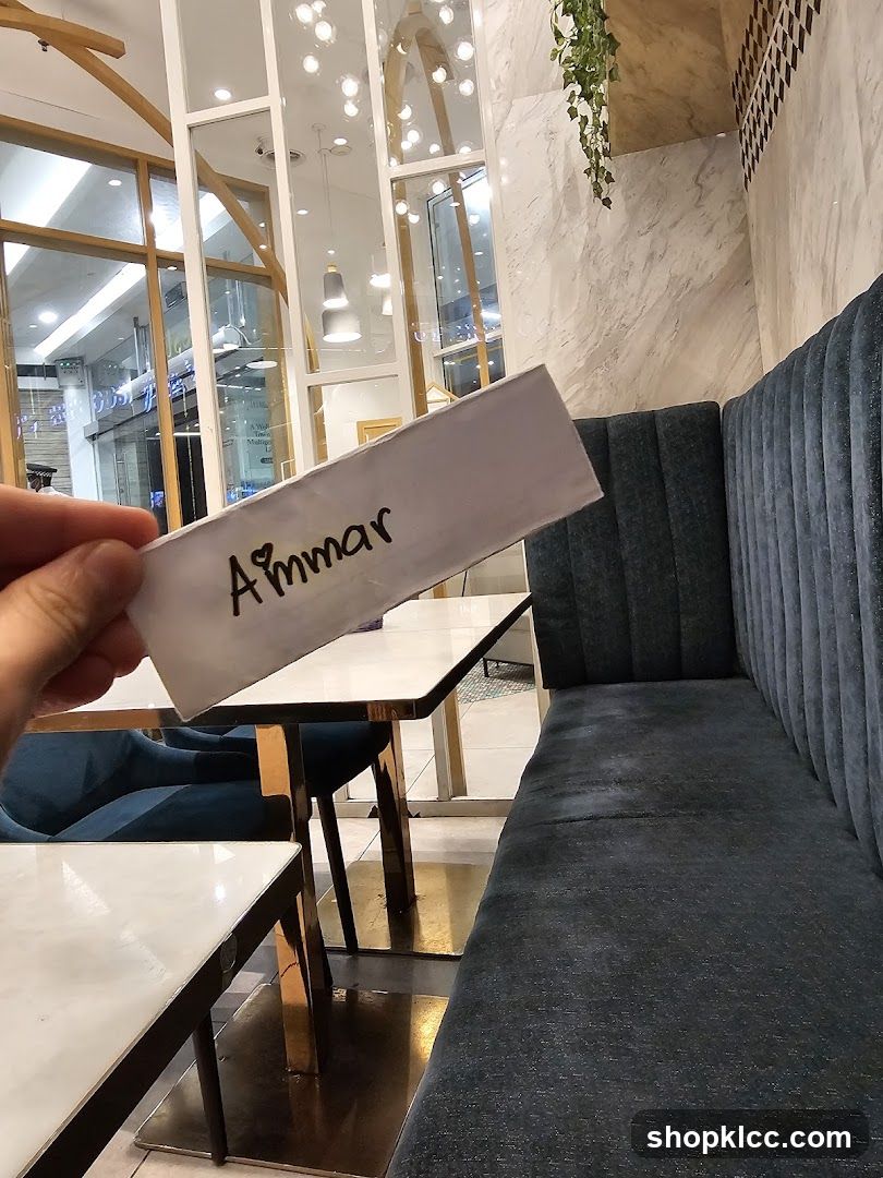 Name card with heart and name