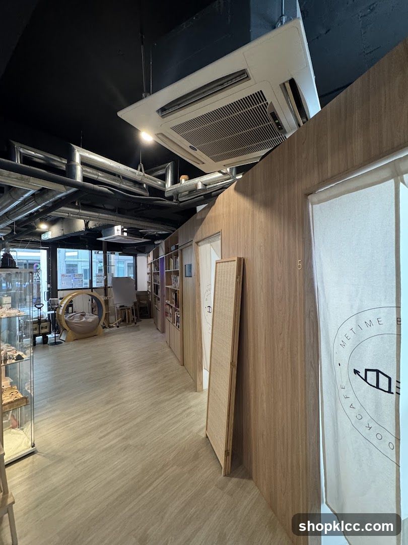 Interior of a cafe with bookshelves and seating