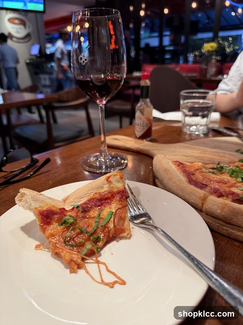 Pizza and Wine at a Restaurant