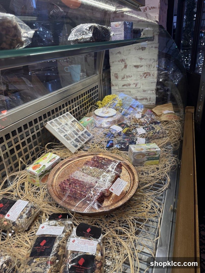 Display case with sweets and teas