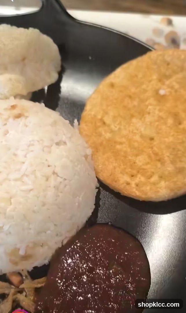 Rice dish with sauce and fried item
