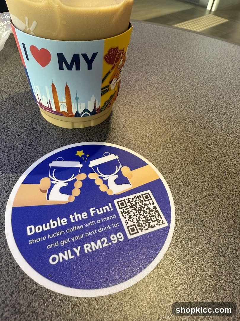 Coffee cup with promotional coaster