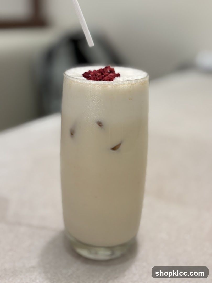 Creamy Drink with Red Garnish