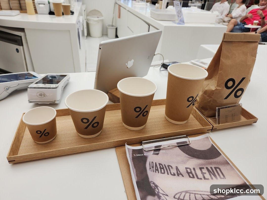 Coffee cups and bag with percentage logo