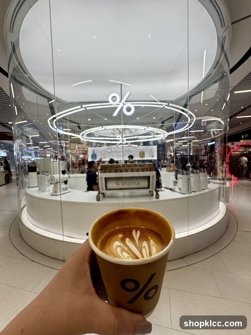Coffee Cup with Latte Art in Front of Cafe
