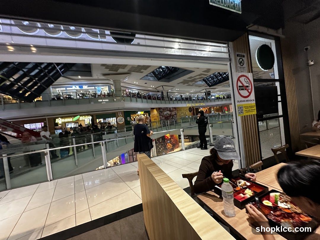 People eating at a restaurant in a mall