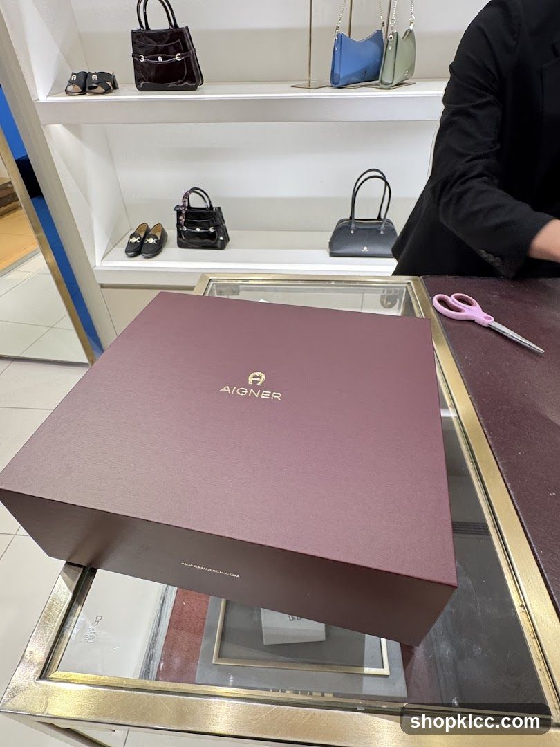 Aigner branded box on display