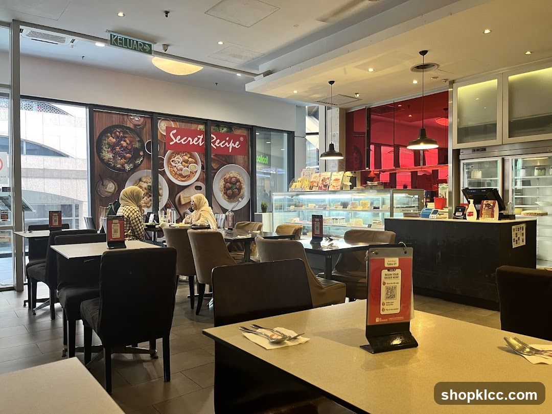 Interior of a cafe with seating and display cases