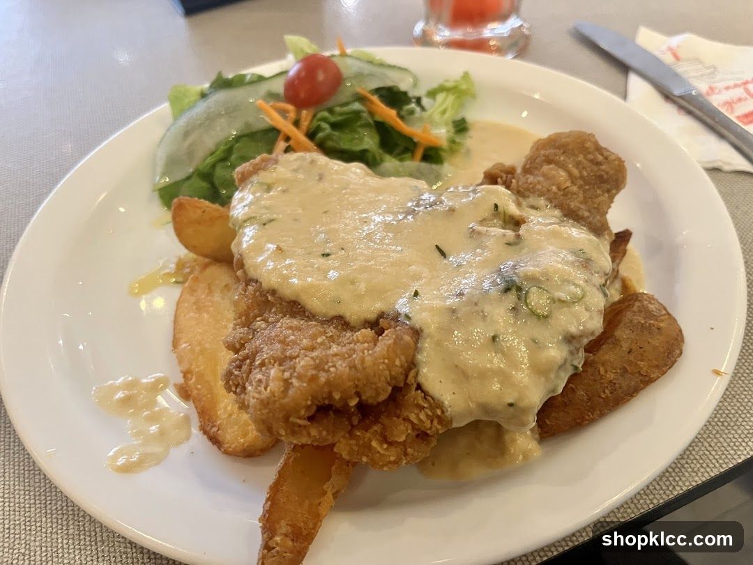 Fried Chicken with Potatoes and Salad