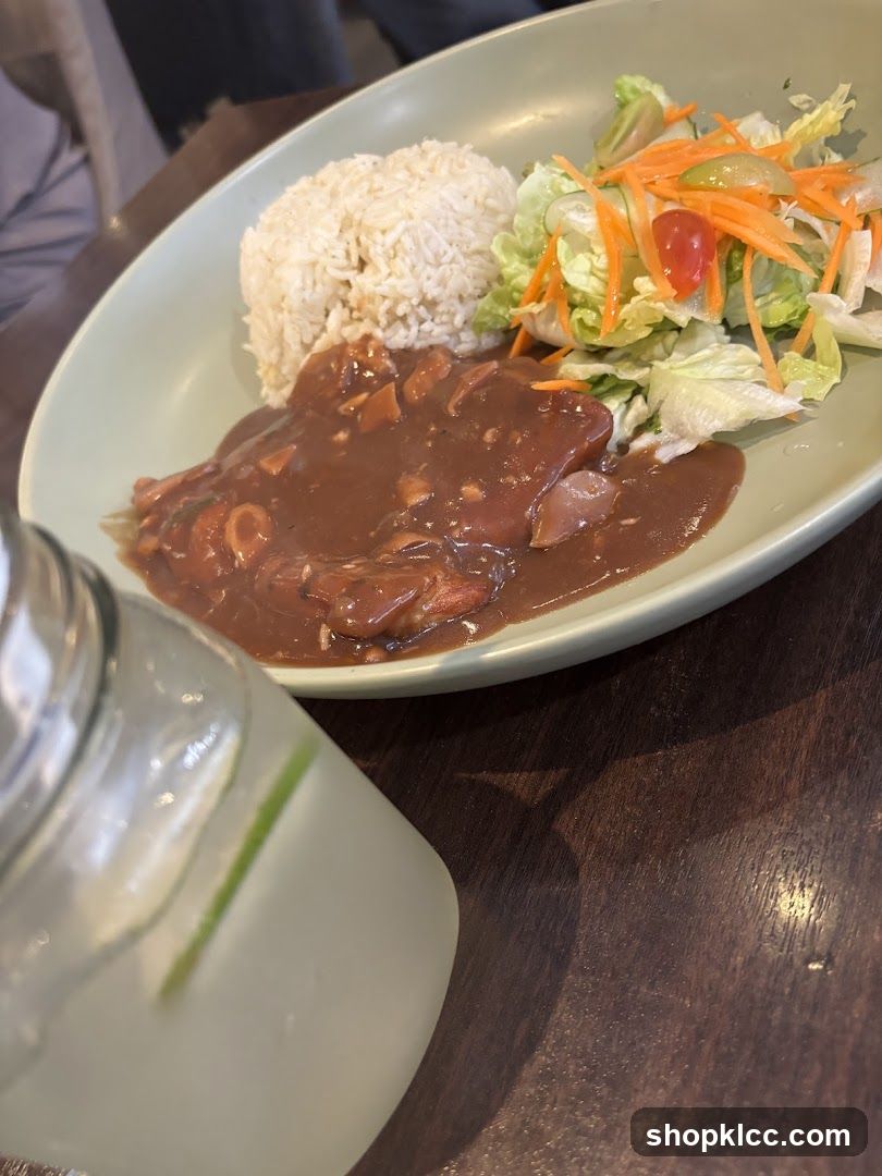 Steak with rice and salad