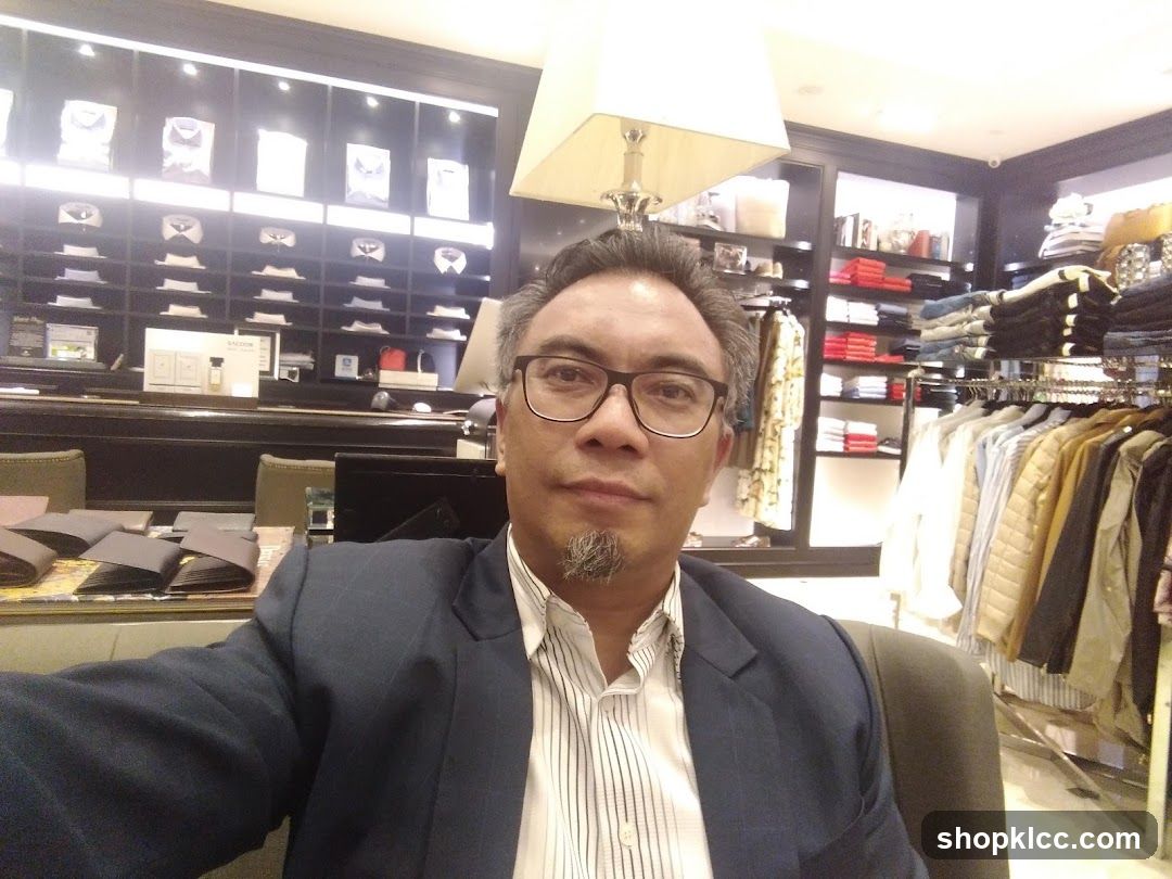 Man in a Suit in a Clothing Store