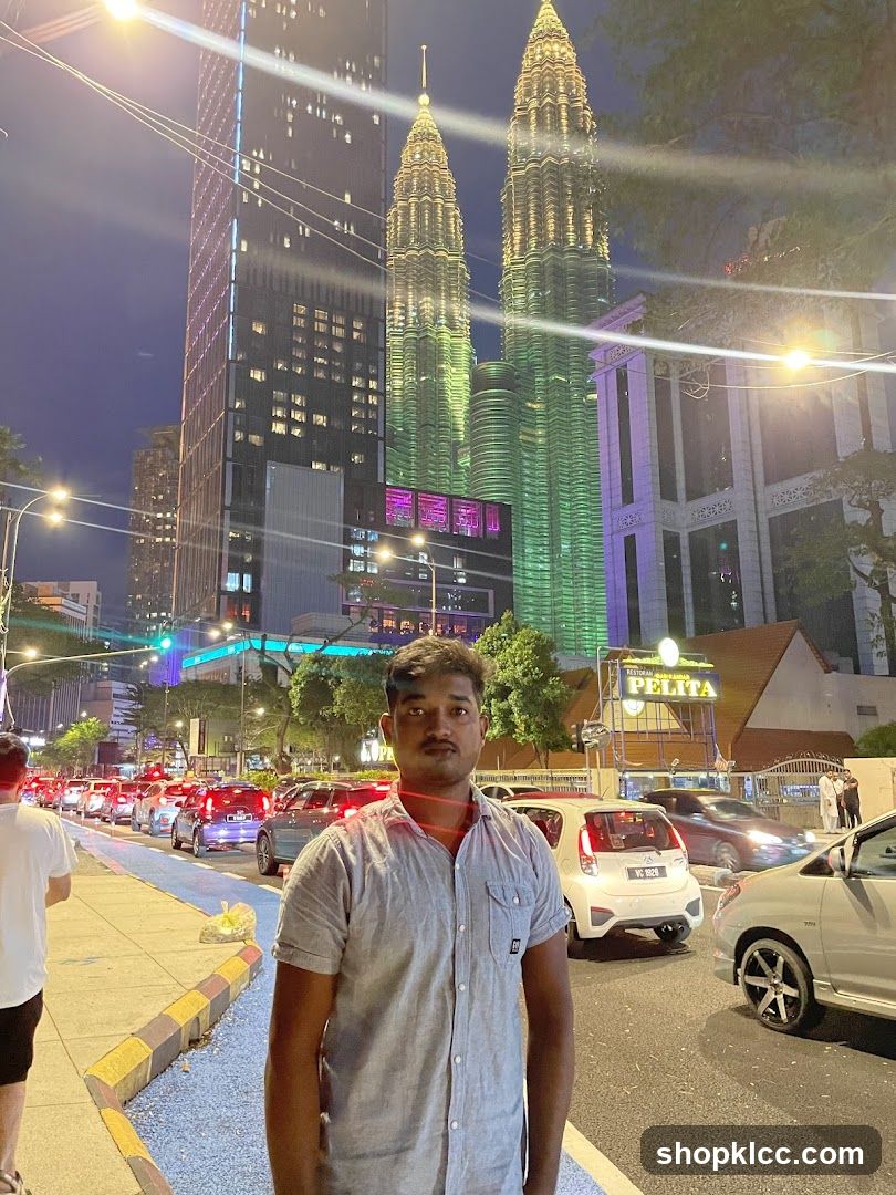 Man in front of Petronas Towers
