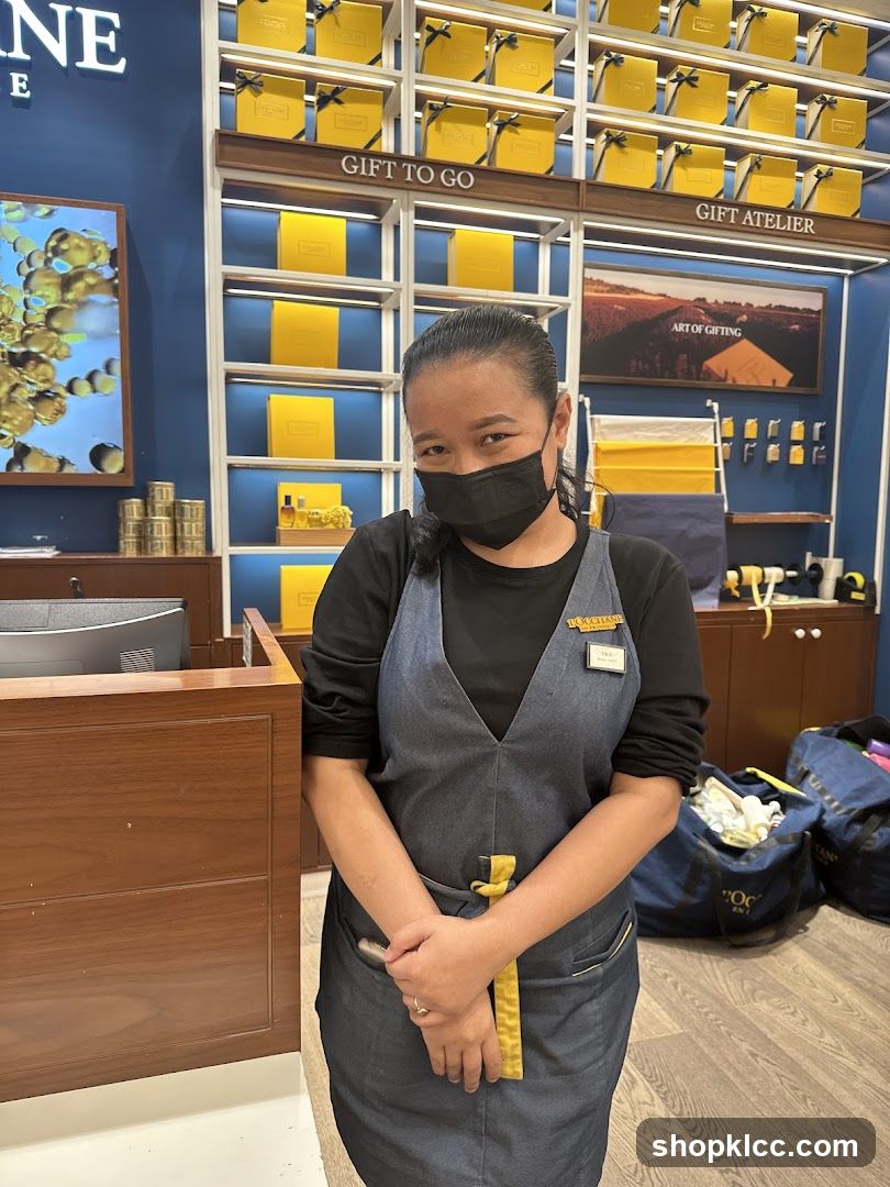 Store employee in a L'Occitane store
