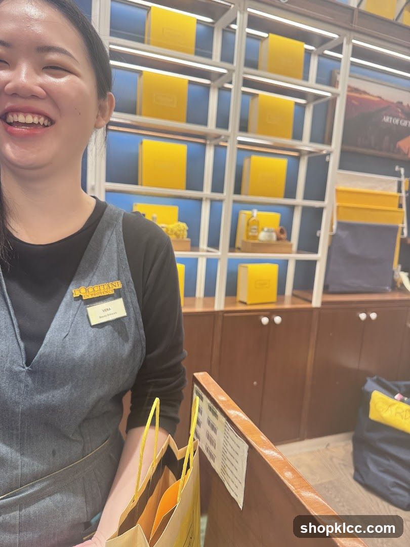 L'Occitane Employee with Shopping Bags