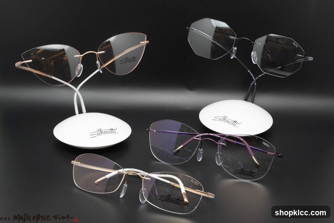 Four pairs of rimless Silhouette eyeglasses
