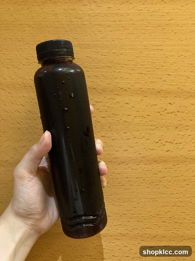 Bottle of Dark Liquid