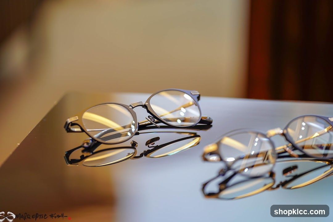 Eyeglasses on a reflective surface