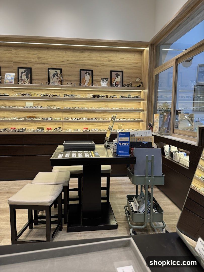 Eyewear store interior with display shelves and seating area