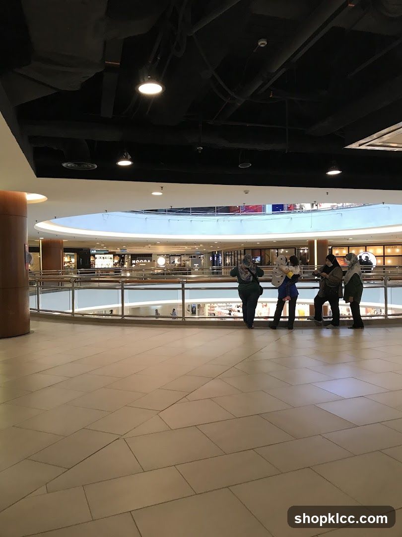Mall Interior with Shops and People