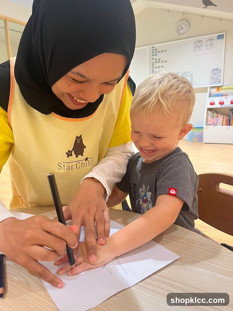 Teacher and child drawing