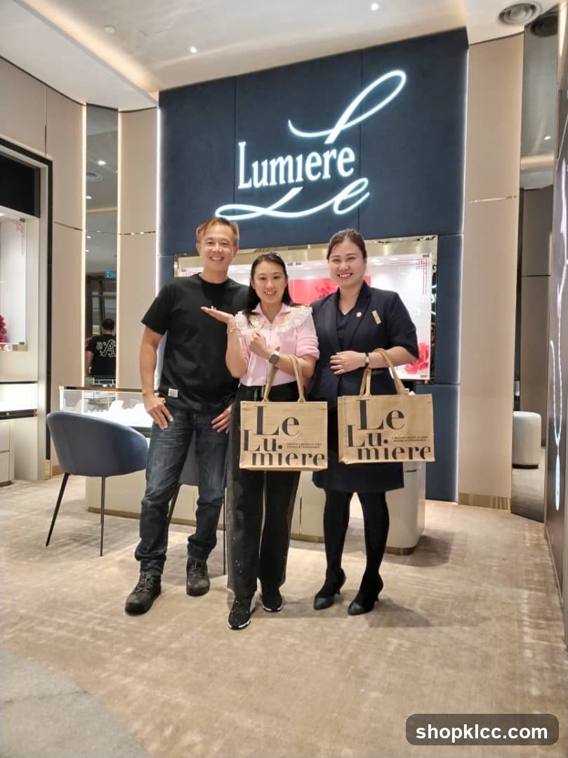 People posing with shopping bags in a store