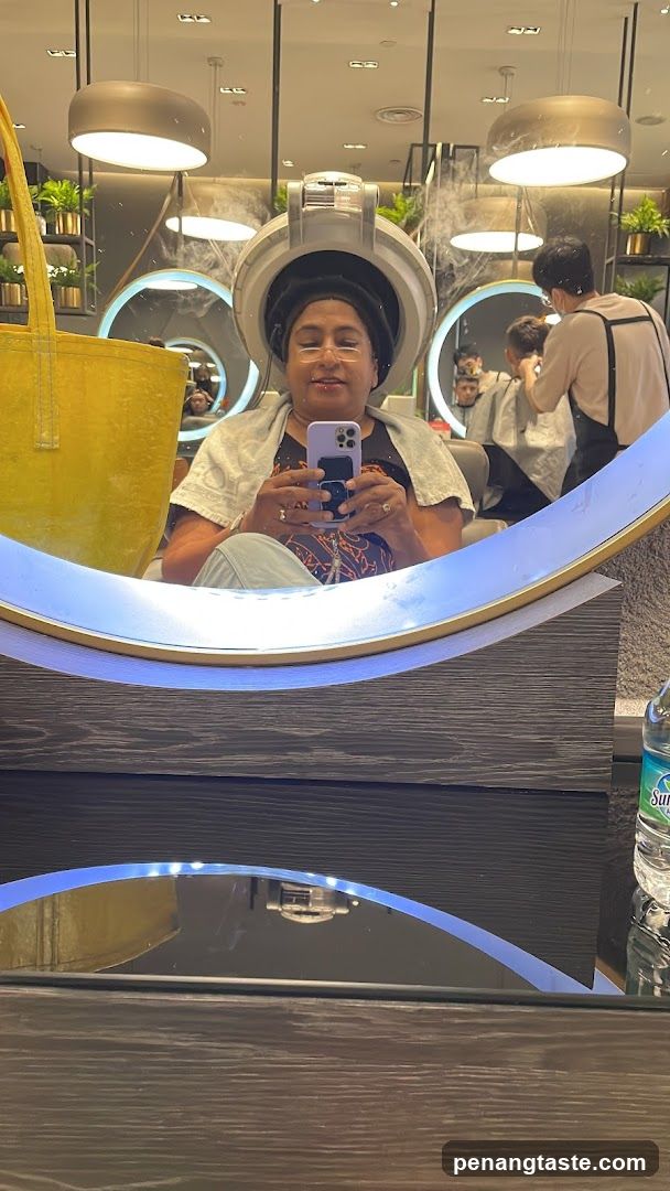 Woman getting hair treatment