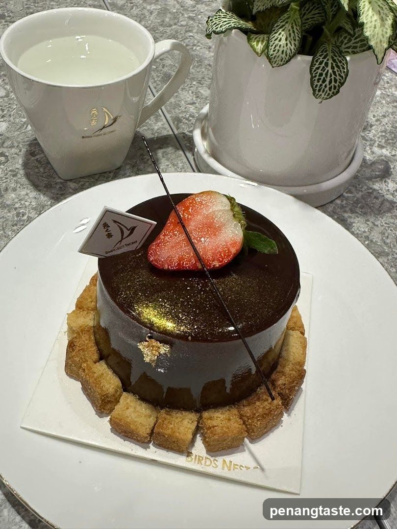 Chocolate cake with strawberry and a drink