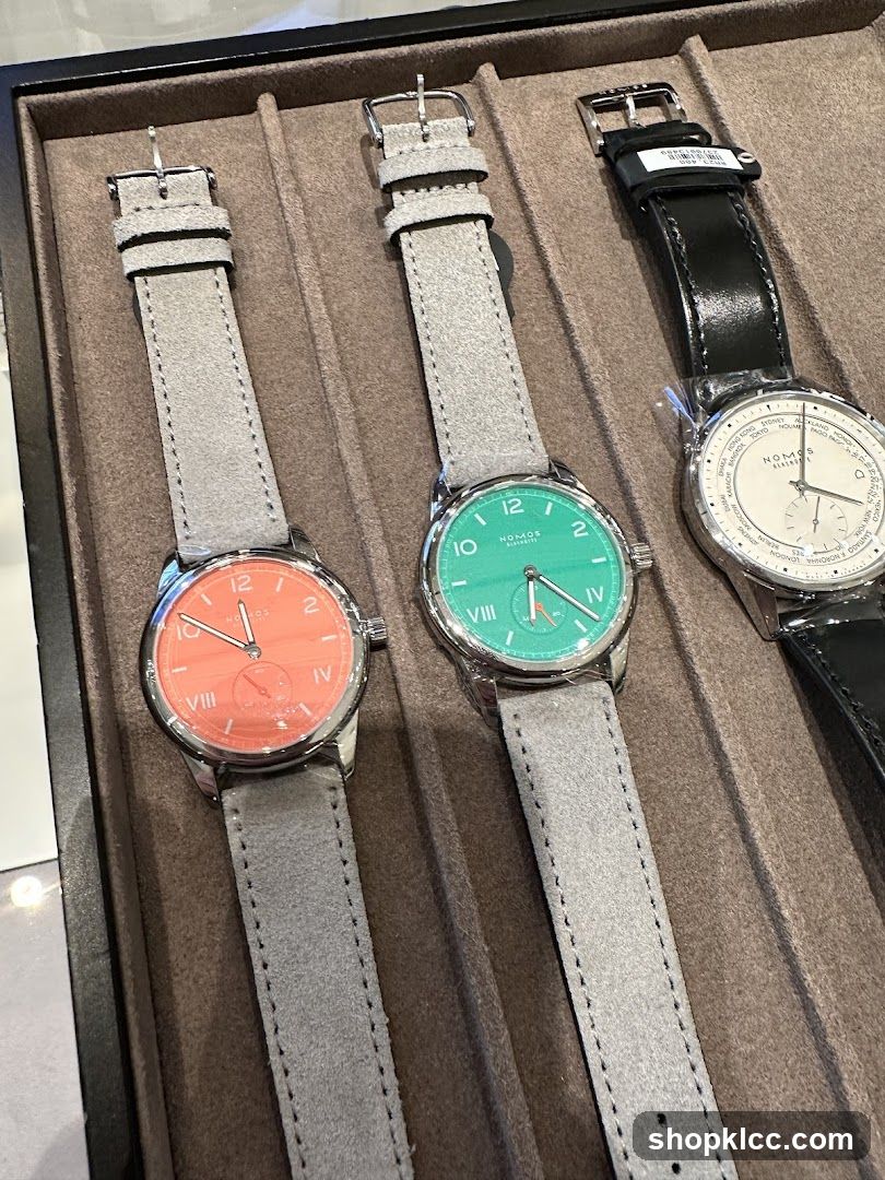 Three watches with colorful dials