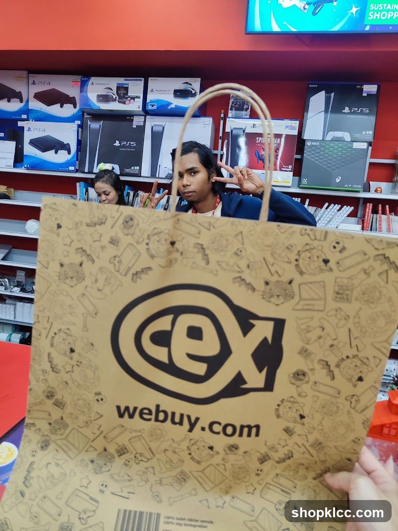 CEX shopping bag with gaming consoles in background