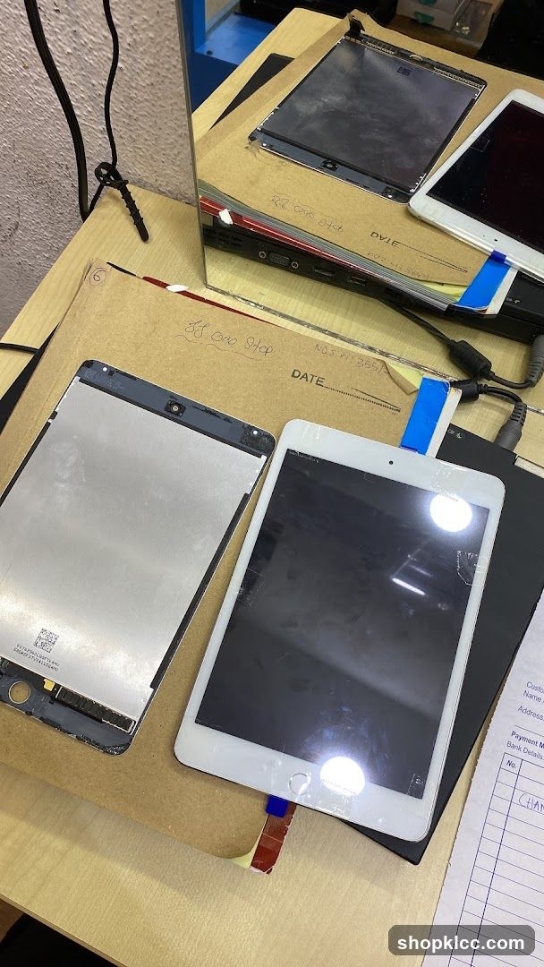 Table with Tablets and Parts