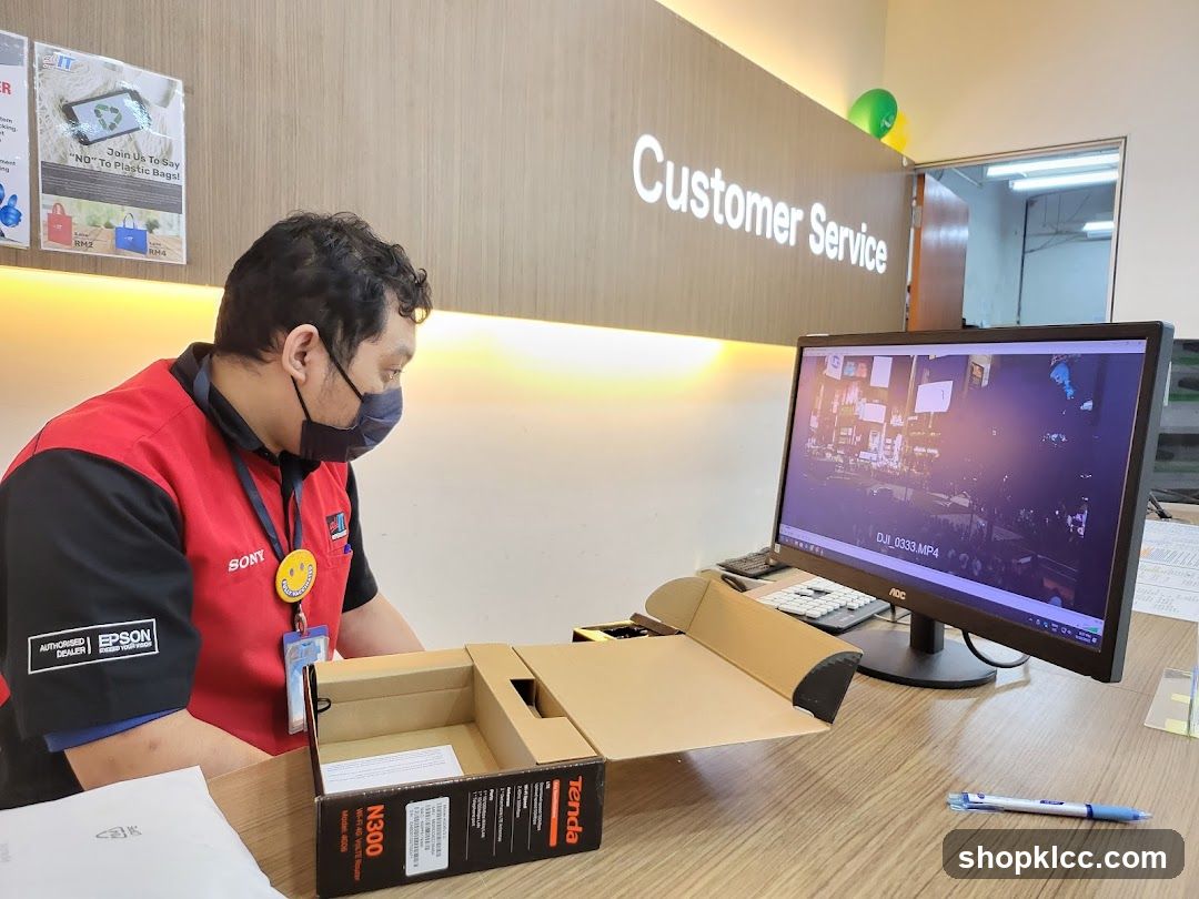 Customer Service Desk with Staff and Electronics Packaging
