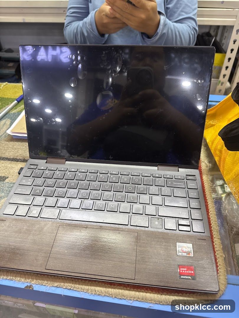 Laptop on table in shop